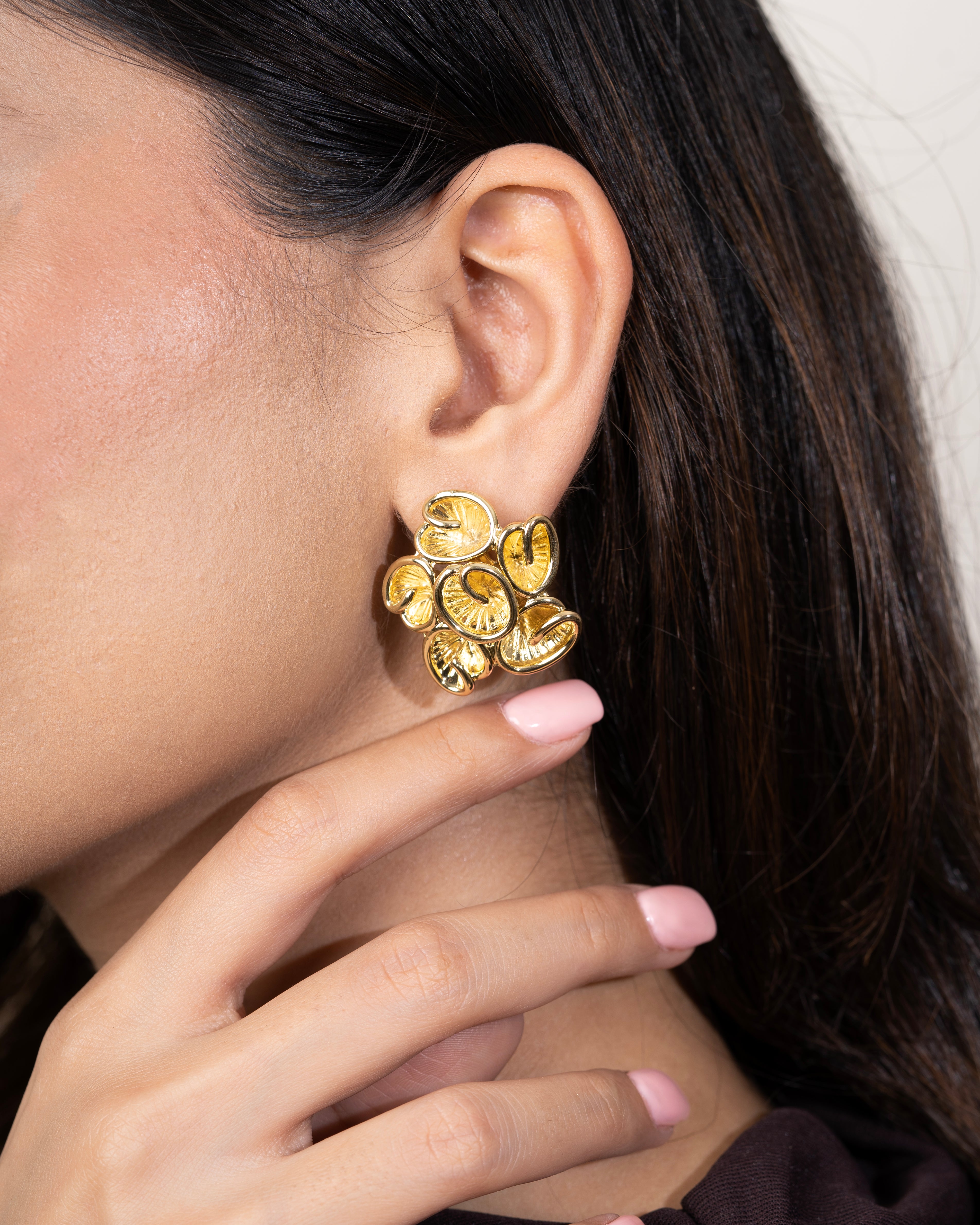 GOLD-TONED STUDS WITH SPIRAL MOTIFS