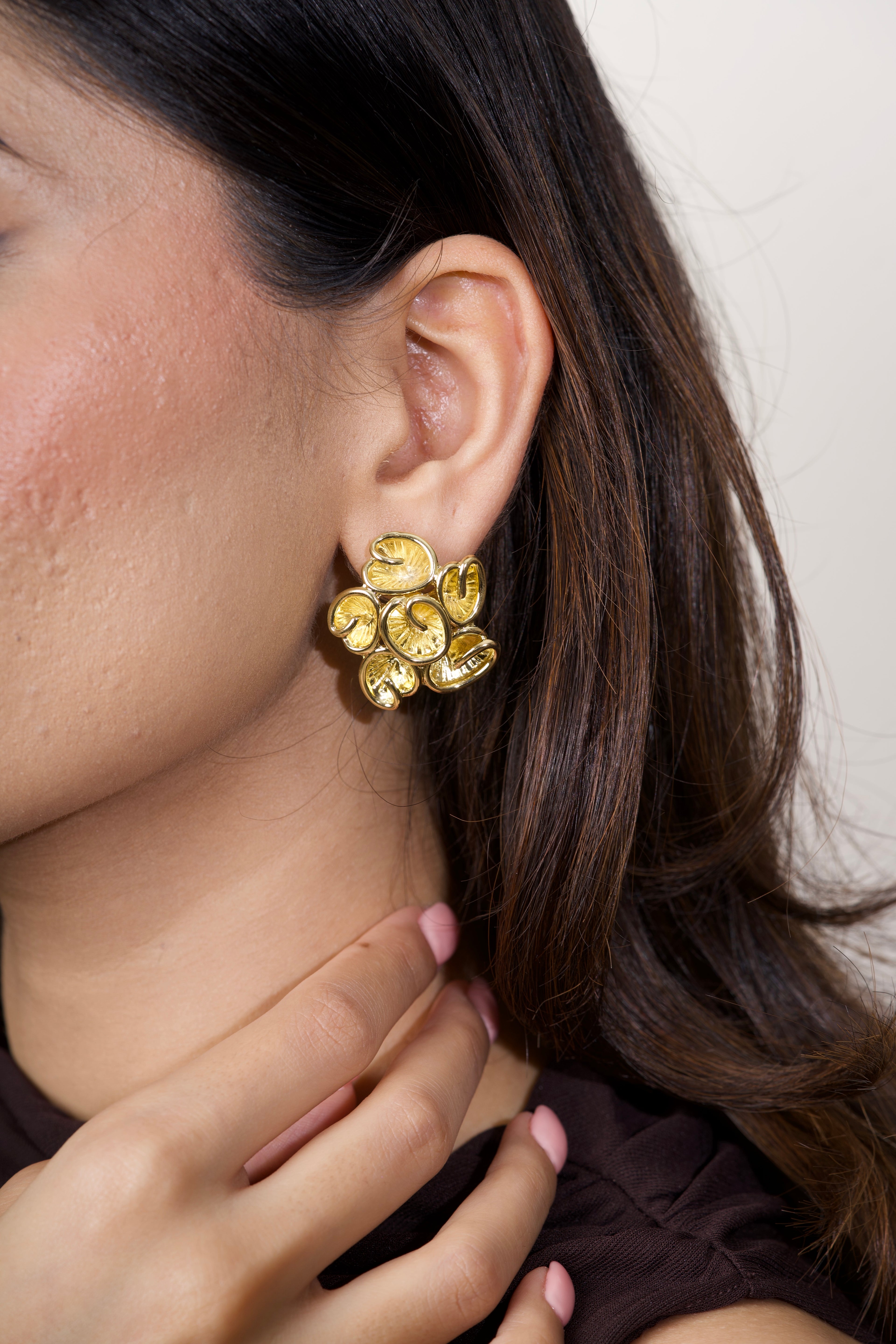 GOLD-TONED STUDS WITH SPIRAL MOTIFS