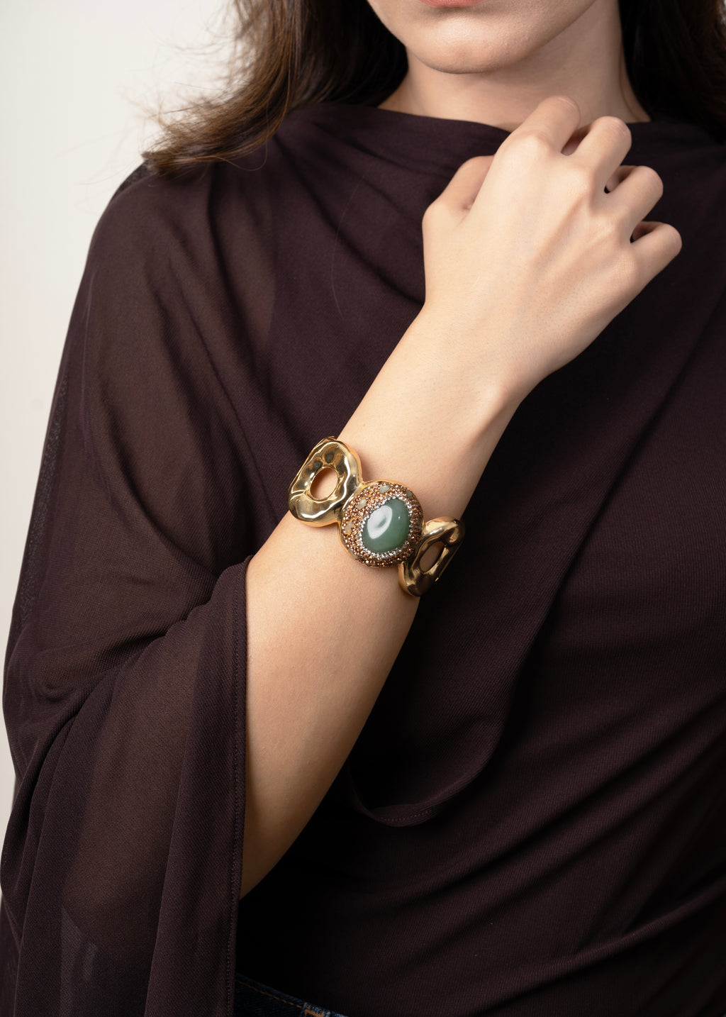 GREEN STONE CIRCULAR GOLD-PLATED CUFF BRACELET