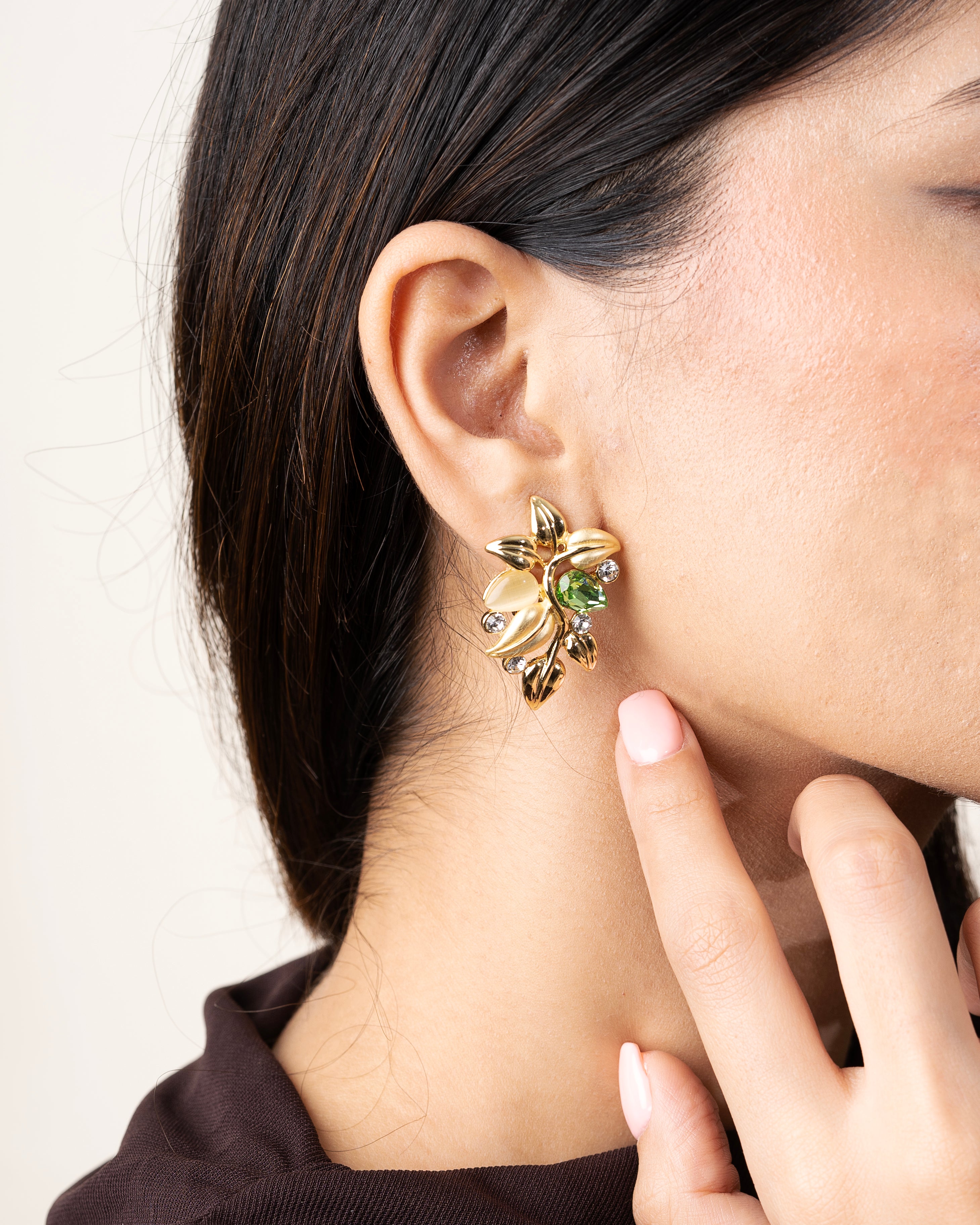 GOLD-TONED PETAL MOTIF EARRINGS WITH GREEN STONE