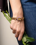 YELLOW STONE GOLD CHAINLINK BRACELET WITH PURPLE STONES