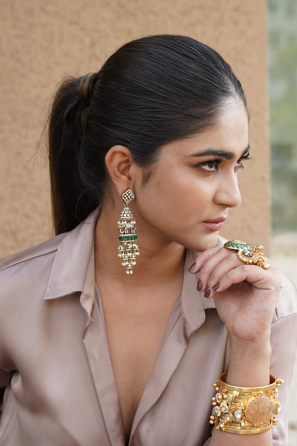 GREEN STONE DOME SHAPED ELEPHANT DANGLING EARRINGS