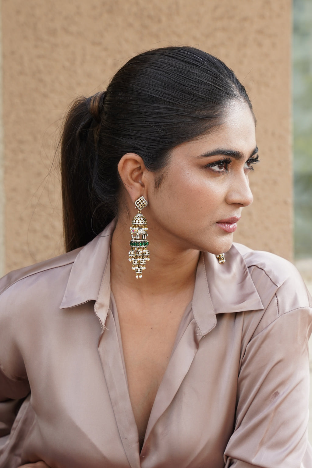 GREEN STONE DOME SHAPED ELEPHANT DANGLING EARRINGS