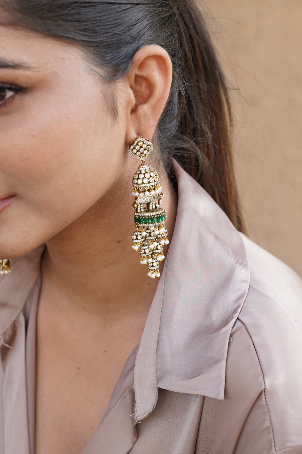 GREEN STONE DOME SHAPED ELEPHANT DANGLING EARRINGS